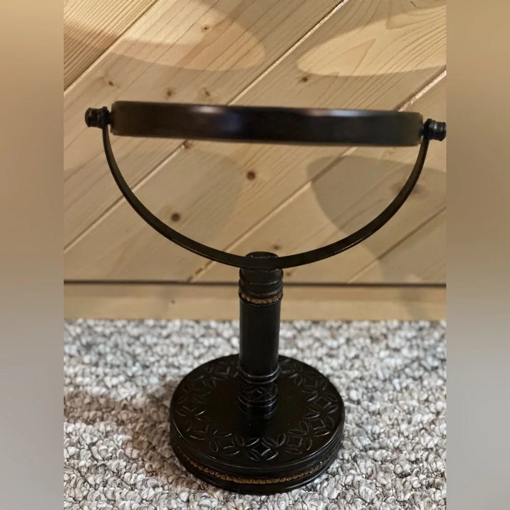 Bathroom countertop double sided magnification mirror.